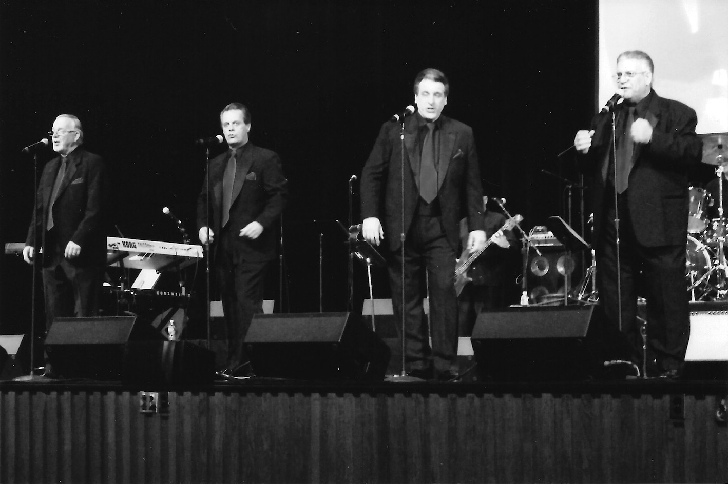 The Devotions singing on stage